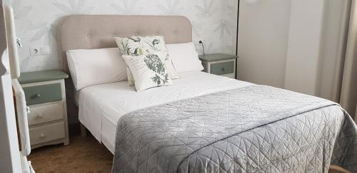 En eller flere senge i et værelse på Concordia, con parking en el puerto de Cambrils