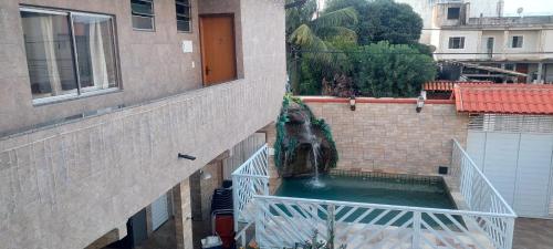 Hostel Falcão-Suites Privativas com Ar Condicionadoにあるバルコニーまたはテラス