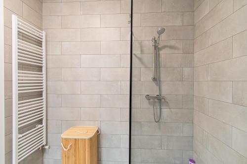 a shower with a glass door in a bathroom at Flexible SelfCheckIns 39 - Zagreb - Parking - New in Zagreb