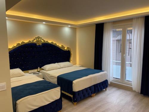 Postel nebo postele na pokoji v ubytování Hotel Barbarosa