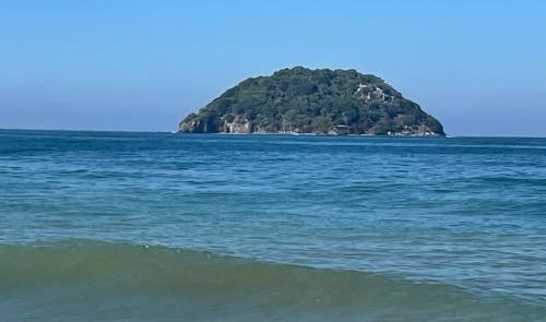 a small island in the middle of the ocean at Casa Moka in La Peñita de Jaltemba