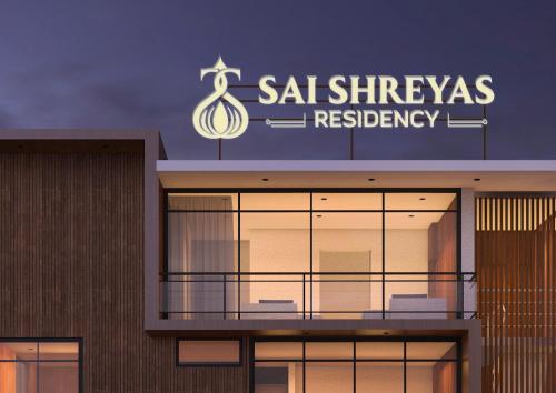 a building with a sign on top of it at Sai Shreyas Residency, Best Hotel near Bangalore Airport in Bengaluru