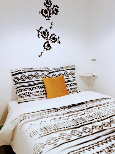 Postel nebo postele na pokoji v ubytování Le Sweet Home appartement tout confort