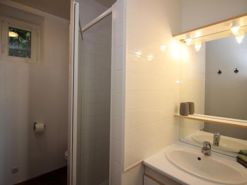 a bathroom with a sink and a shower at Appartement Mont-Dore, 3 pièces, 5 personnes - FR-1-608-40 in Le Mont-Dore