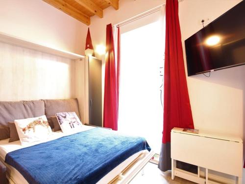 เตียงในห้องที่ Appartement Mont-Dore, 2 pièces, 4 personnes - FR-1-608-68