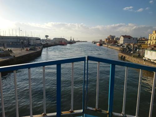 a view of a river from a bridge at Summer&Winter Home by the sea in Fiumicino