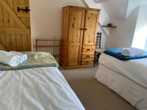 Postel nebo postele na pokoji v ubytování Scenic Welsh Cottage in the Brecon Beacons