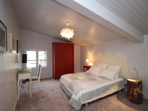 Postel nebo postele na pokoji v ubytování Duplex T3 Hyper Centre Mont-Dore avec WiFi - FR-1-608-1