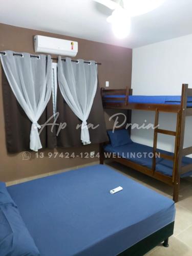 Кровать или кровати в номере Lindo Apartamento até 10 pessoas, Praia Enseada Guarujá