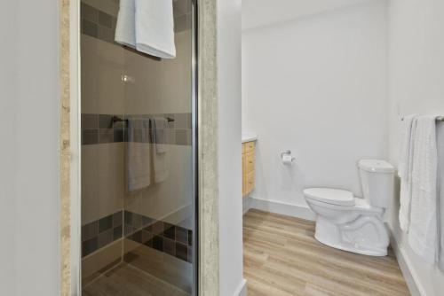 a bathroom with a shower and a toilet at Four Peaks - Unit 40A in Collingwood