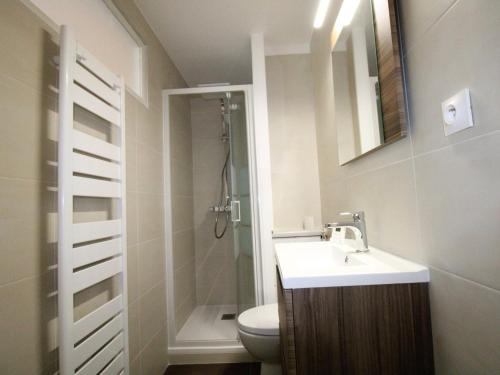 a bathroom with a sink and a toilet and a shower at Studio Avoriaz, 1 pièce, 2 personnes - FR-1-633-16 in Avoriaz