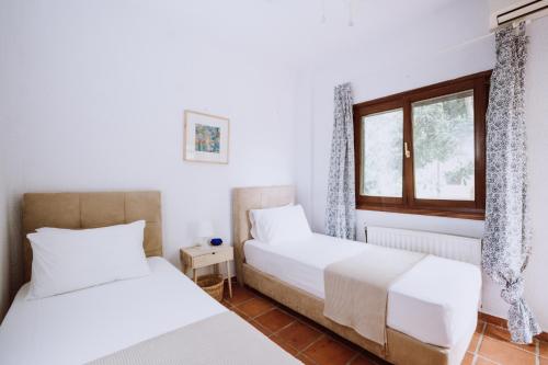 A bed or beds in a room at Forest house Near the sea