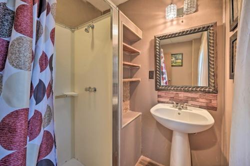a bathroom with a sink and a shower and a mirror at Bill Pickett Apt on 50-Acre Ranch - 1 Mi to Lake in Huntingdon
