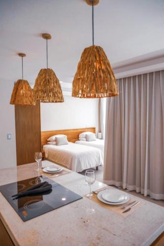 Ein Bett oder Betten in einem Zimmer der Unterkunft The Waves Tulum by BNB Experience