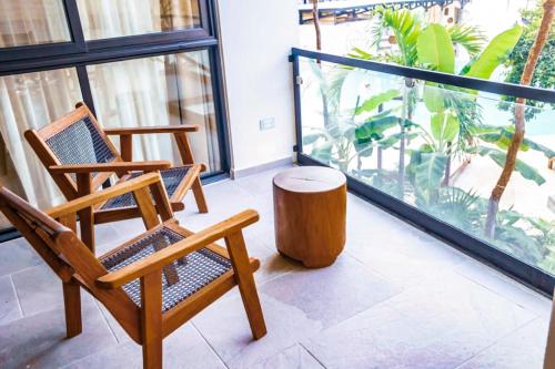 Ein Balkon oder eine Terrasse in der Unterkunft The Waves Tulum by BNB Experience