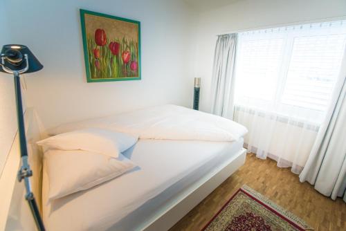Postel nebo postele na pokoji v ubytování Hotel Hohberg "Next to BBC Arena"