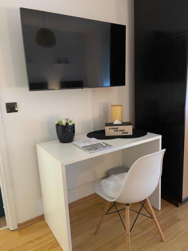 TV a/nebo společenská místnost v ubytování Comodo apartman Vinkovci