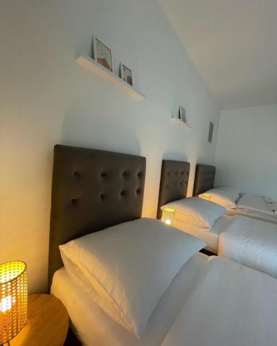 Postel nebo postele na pokoji v ubytování Comodo apartman Vinkovci