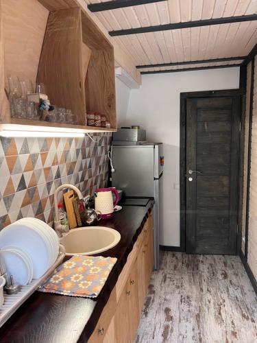 Η κουζίνα ή μικρή κουζίνα στο U Yaroslava Hotel