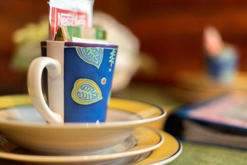 Log Cabin Motelにあるコーヒーまたはお茶