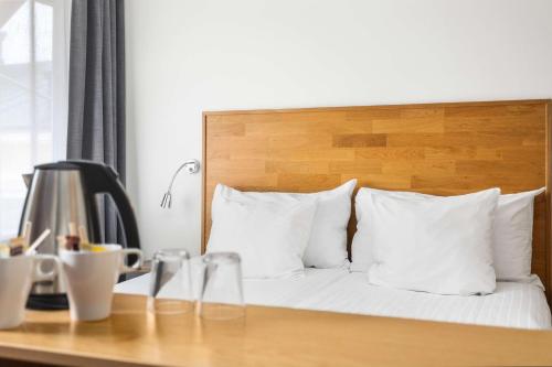 Säng eller sängar i ett rum på Best Western Sjofartshotellet