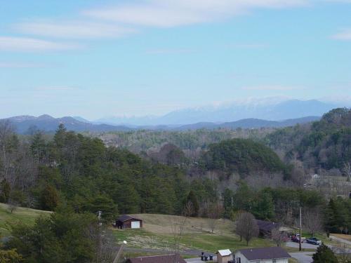 a view of a valley with mountains in the distance at ERN854 - Wagon Wheel Lodge - Great Location! Close To All The Action! cabin in Pigeon Forge
