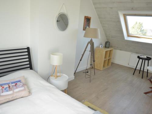 Postel nebo postele na pokoji v ubytování Charming holiday home near the beach, Locquirec