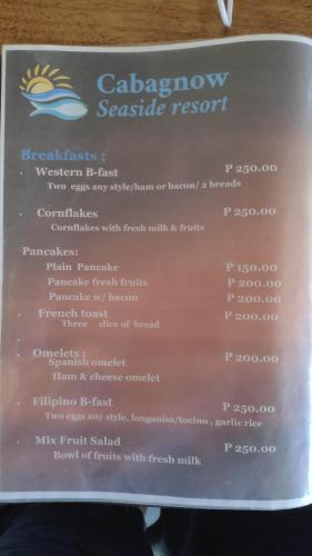 a menu for the calabase pasta restaurant at Cabagnow Seaside Resort in Anda