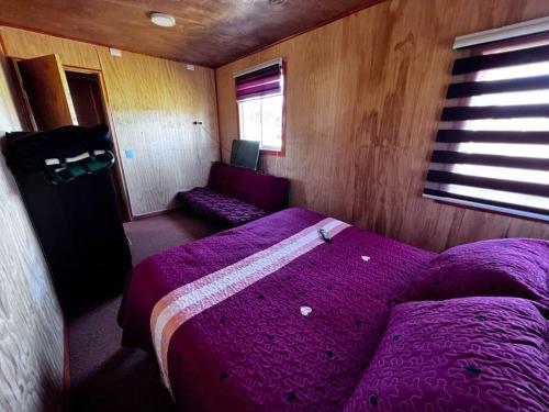 Ein Bett oder Betten in einem Zimmer der Unterkunft Lugar de descanso, con Tinaja al aire libre.