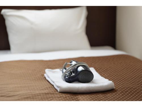 Postel nebo postele na pokoji v ubytování Hotel Suntargas Otsuka