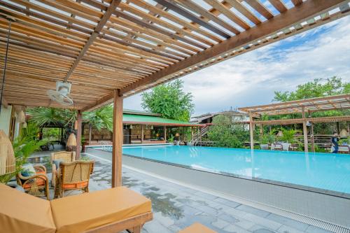 Bazén v ubytování Peam Snea Resort nebo v jeho okolí