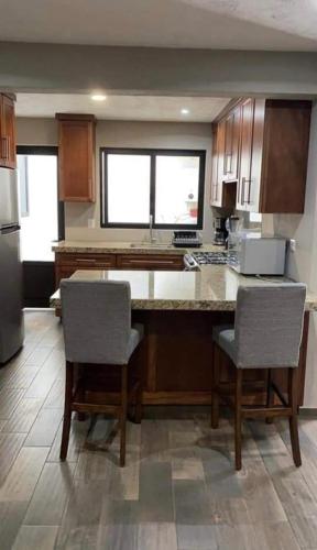 A kitchen or kitchenette at JM apartamentos