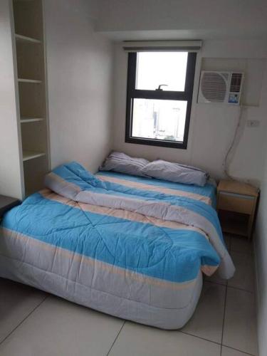 Cama o camas de una habitación en 1 bedrm condo, Tower 2, Hor 101