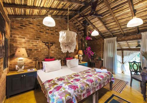 Ένα ή περισσότερα κρεβάτια σε δωμάτιο στο Turia Villa Canacona Palolem