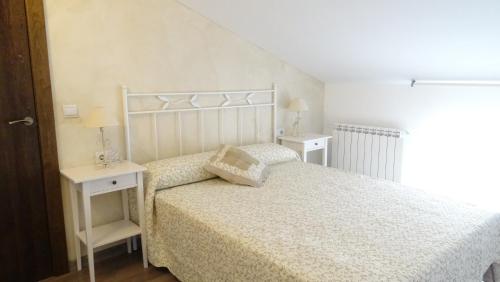 Postel nebo postele na pokoji v ubytování Apartamentos Turísticos Teruel