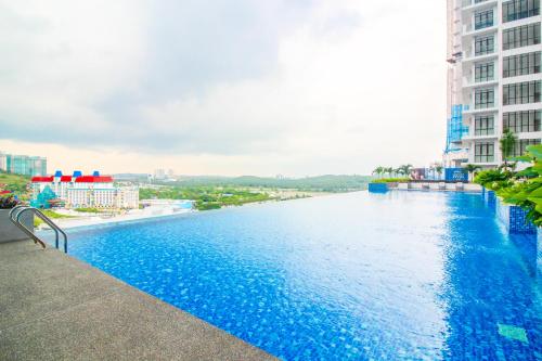 a view of a river in a city with buildings at D'Pristine Theme Suite by Nest Home at LEGOLAND in Nusajaya