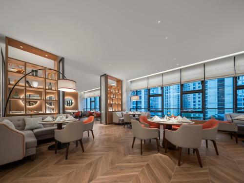 Χώρος καθιστικού στο Grand New Century Hotel Wenzhou