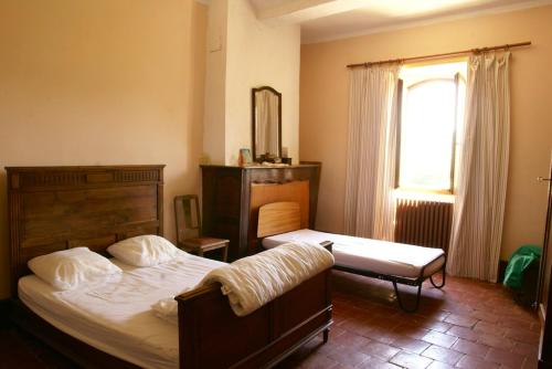 Postel nebo postele na pokoji v ubytování Spacieuse maison familiale à Beaulieu - 250 m² avec vue montagne