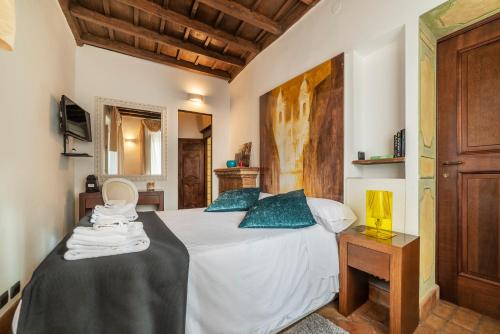 En eller flere senger på et rom på Luxury Trastevere