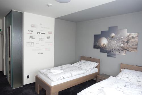 Кровать или кровати в номере Penzion Vrtule