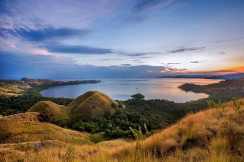 a view of a body of water from a hill at Plataran Komodo Resort & Spa - CHSE Certified in Labuan Bajo