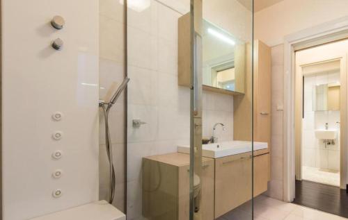 a bathroom with a shower and a sink at Athens Plaka Hill luxury Flat in Athens