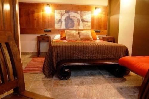 Cama o camas de una habitación en Hotel Casa Rural y Eventos Bonestar