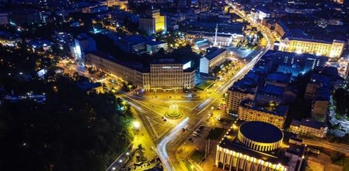 an overhead view of a city at night at Dnipro Hotel in Kyiv