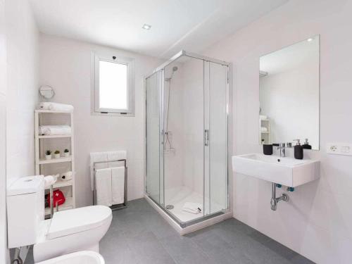 a bathroom with a shower and a toilet and a sink at Villa Calm Ocean views by Infinity Summer in La Playa de Arguineguín