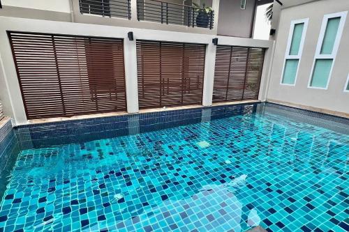Bazén v ubytování Sivana Place Phuket nebo v jeho okolí