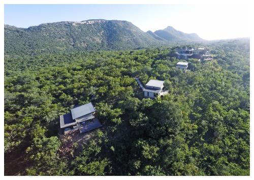 an aerial view of a house in the forest at umVangati House in Hoedspruit