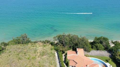 an aerial view of a house and the ocean at Sunny House in Byala