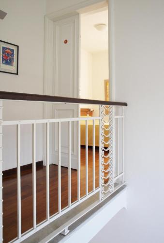 a view of the staircase of a house with a glass railing at Affittacamere Bel Sole in Borghetto di Vara