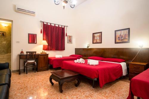 Postel nebo postele na pokoji v ubytování Aci B&B
